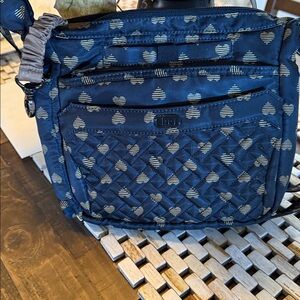 Lug Flutter black with gold hearts. Water bottle, cellphone pocket.  Key ring.